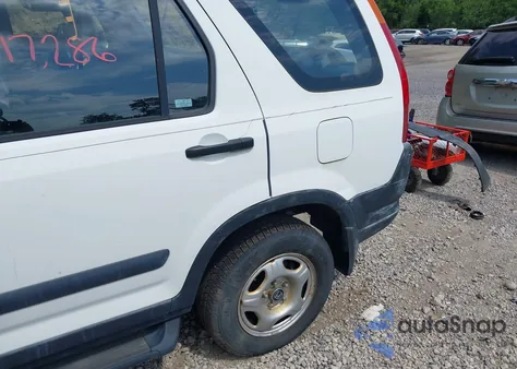 2004 Honda Cr-V Lx z USA, uszkodzony, nr VIN JHLRD68444C011421